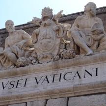 a statue on the side of a building