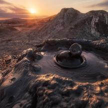 a bird bath in the middle of a desert