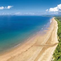 an aerial view of a beach and the ocean