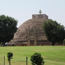 a large pyramid with a cross on top of it