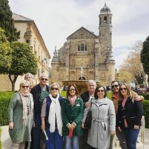 a group of people standing in front of a building