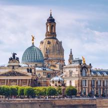 a large building with two domes on top of it