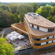 an overhead view of a building with a roof