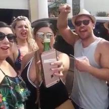 a group of people posing for a picture with a trophy