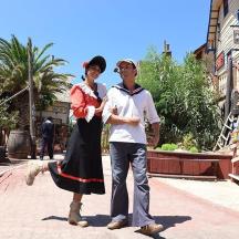 a man and a woman standing on a street