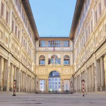 a large building with columns and a large hallway