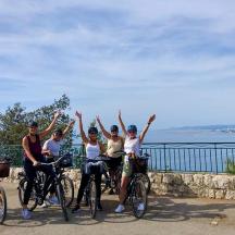 a group of people on bikes posing for a picture
