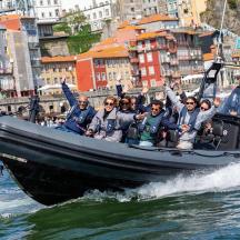 a group of people on a boat in the water