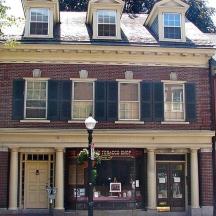 a brick house with a street light in front of it