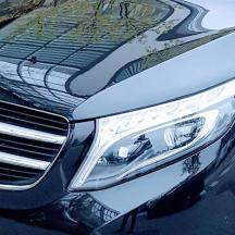 a close up of the front of a mercedes benz car