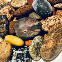 a pile of rocks and minerals on a plate