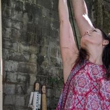 a man and a woman with their arms in the air