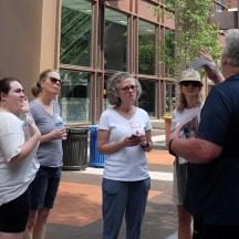 a group of people standing in front of a building