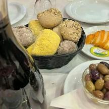 a table topped with plates of different types of food