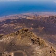 an aerial view of a mountain in the desert