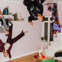 a group of people on skateboards in a room