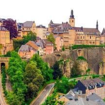 a view of a city with buildings and a castle