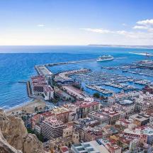an aerial view of a city with a harbor