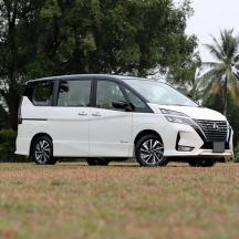 a white van is parked in a field
