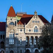 a large stone building with red roof