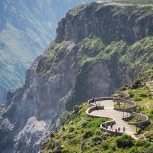 a winding road on the side of a mountain
