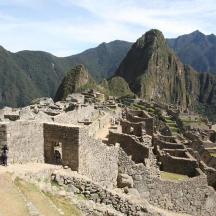 a group of people standing on top of a mountain