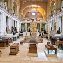 a large museum with statues and artifacts on display