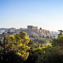 a castle on top of a hill with trees