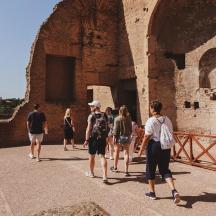 a group of people standing outside of a building