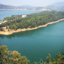 an island in the middle of a large lake