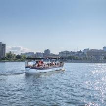 a group of people on a boat on a river