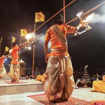 a group of people on a stage with torches