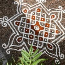 a drawing of a butterfly on the ground