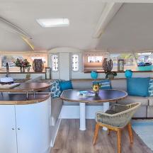 a kitchen and living room of a caravan