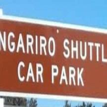 a street sign for a car park