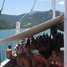 a group of people on a boat in the water