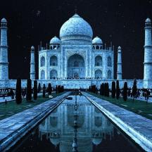 a view of the taj mahal at night