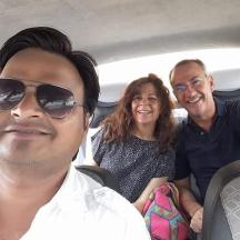 a group of people sitting in a car