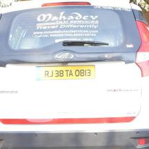a car with a sticker on the back of it