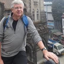 a man standing on top of a building
