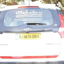 a car with a sticker on the back of it