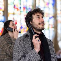 a man and a woman talking on cell phones