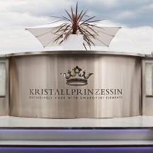 znak za muzej Kristal Amplification z rastlino na vrhu