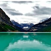 a view of a lake with mountains in the background