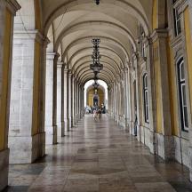 an empty hallway of a building with an arcade