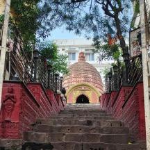 a stairway leading up to a building with a building