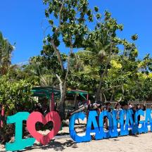 a sign on the beach that says i love miami