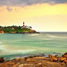 a lighthouse on a small island in the water