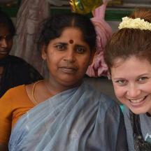 a woman is standing next to a woman
