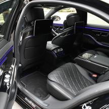 an open trunk of a car with the door open
